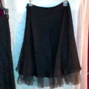 Black lace and tulle skirt. Gorgeous detail. Lined